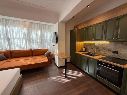 Kuchyň nebo kuchyňský kout v ubytování TOT Apartment