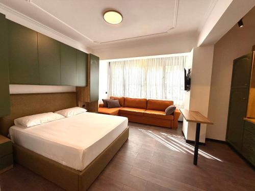 Postel nebo postele na pokoji v ubytování TOT Apartment