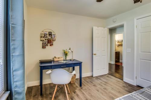 a room with a blue desk and a white chair at The Southern State of Mind by Stay Local Nashville in Nashville