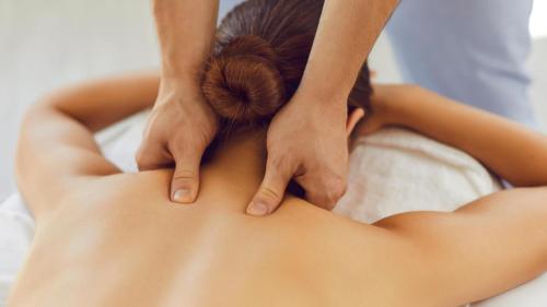 a woman with her hands on her stomach with a flower at Kempinski Hotel Taiyuan in Taiyuan