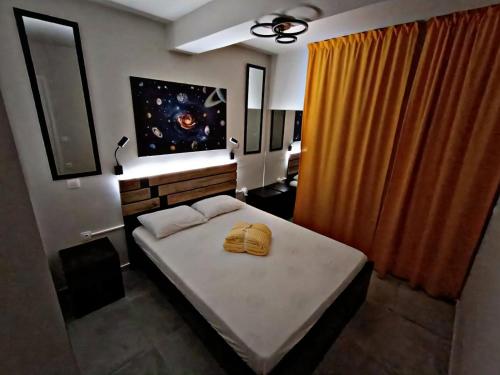 Giường trong phòng chung tại Poseidon Apartments