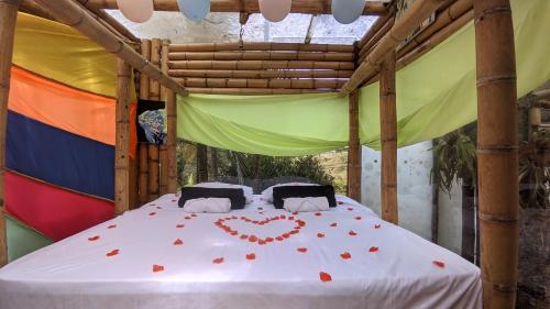 Postel nebo postele na pokoji v ubytování BioHotel Ecohouse