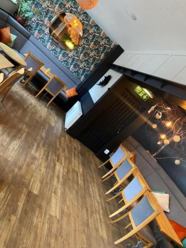 an overhead view of a living room with a ladder at The Bear On The Square in Millom
