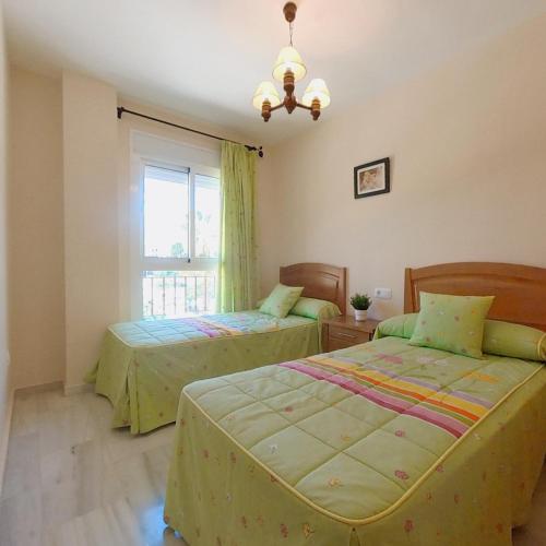 Postel nebo postele na pokoji v ubytování Terrasol Azucarera 3 Dormitorios