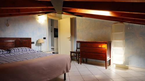 Postel nebo postele na pokoji v ubytování Appartamenti Villa Lina