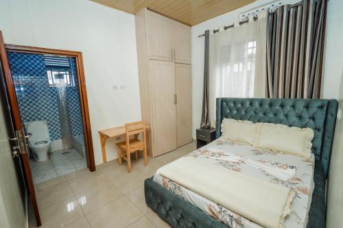 Un ou plusieurs lits dans un hébergement de l'établissement Casa Kigali