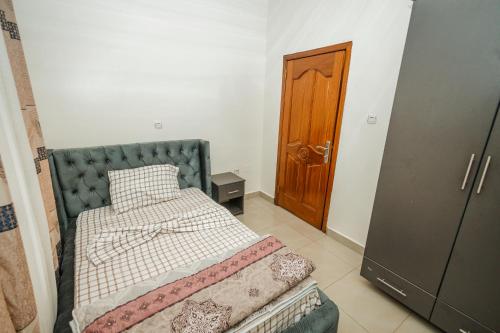 Un ou plusieurs lits dans un hébergement de l'établissement Casa Kigali