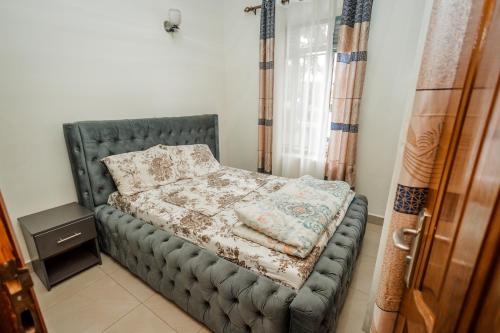Un ou plusieurs lits dans un hébergement de l'établissement Casa Kigali