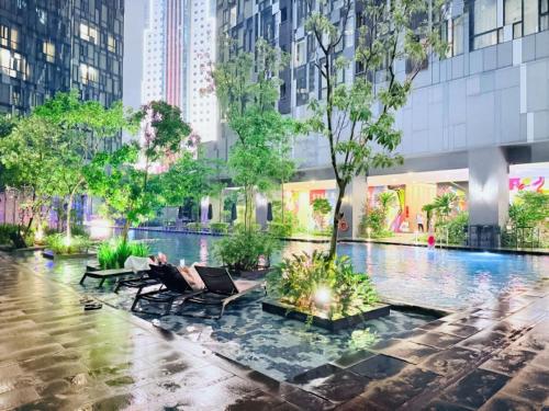 a rendering of a pool in a city at Star Residence KLCC By Cozy in Kuala Lumpur