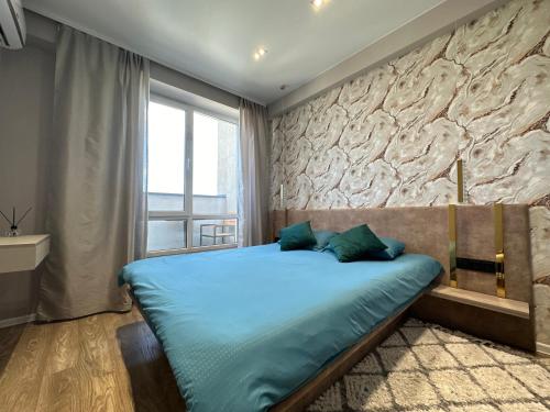 Katil atau katil-katil dalam bilik di Modern Penthouse with Top Panoramic City View Royal Braus Chisinau