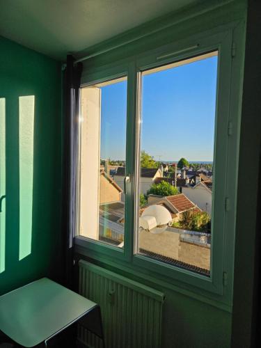 Photo de la galerie de l'établissement Appartement lumineux meublé, à Saint-André-les-Vergers