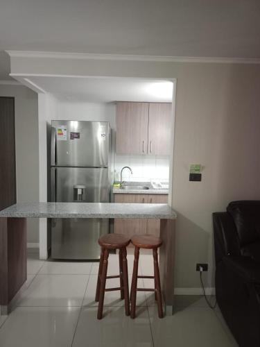 Kuchyň nebo kuchyňský kout v ubytování Departamento 2 habitaciones calama cerca del aeropuerto