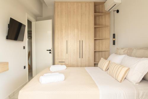 Postel nebo postele na pokoji v ubytování Anesis Deluxe Apartment 2