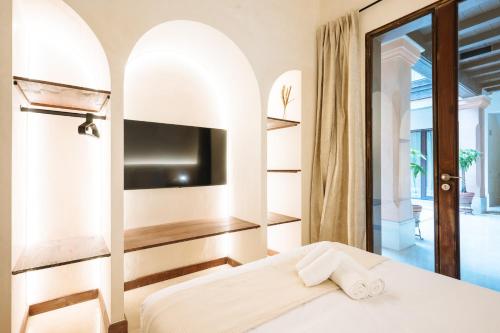 Postel nebo postele na pokoji v ubytování Apartamentos La Vistosona