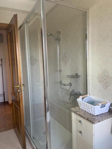 a shower with a glass door in a bathroom at Villa Maria in Marano Principato