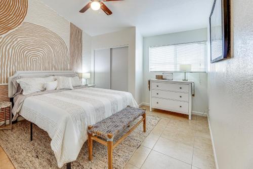 a bedroom with a bed and a dresser and a window at 7 Mi to ASU Family Retreat with Pool Access in Mesa