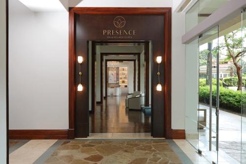 a hallway leading into a building with a entrance at InterContinental Costa Rica at Multiplaza Mall by IHG in San José