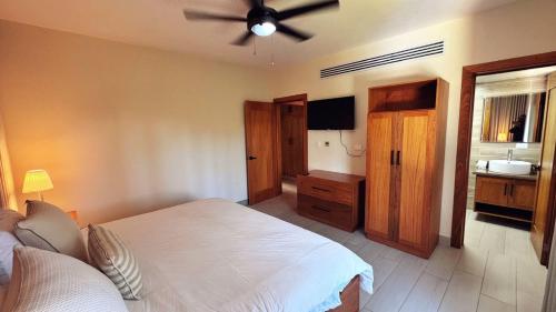 Кровать или кровати в номере Vista del Campo Country Club & Villas