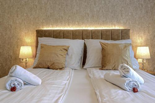 Dioro Luxury Residence Budapest- Steps from the Danube ,free parkingにあるベッド