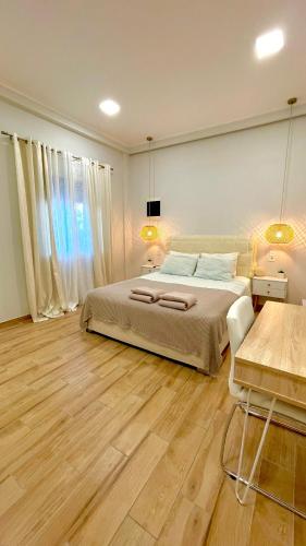 Postel nebo postele na pokoji v ubytování Elia Room & Garden