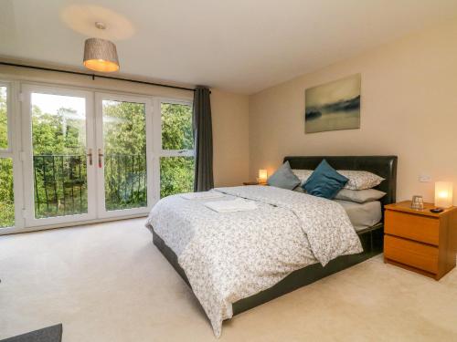 a bedroom with a bed and a window at Spicery in Exeter