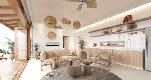 a living room with a couch and a table at Overthemoon Luxury Pool Villas in Koh Tao