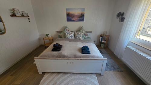Postel nebo postele na pokoji v ubytování Ferienwohnung Ernebibbel