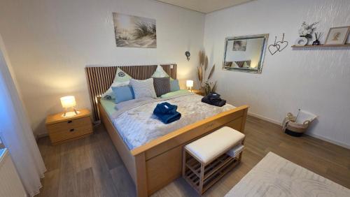 Postel nebo postele na pokoji v ubytování Ferienwohnung Ernebibbel