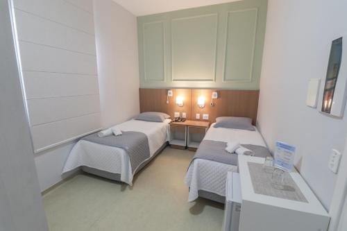 Katil atau katil-katil dalam bilik di Santorini Hotel Ltda
