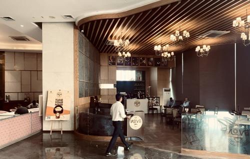 Zona de estar de Supernova Spira Noida