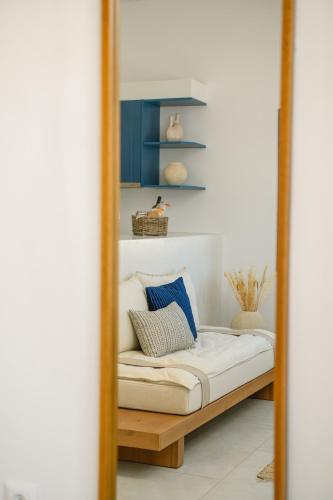 Una cama o camas en una habitación de Amorgiani Gi