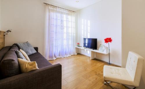 TV a/nebo společenská místnost v ubytování Apartment Acero Rosso