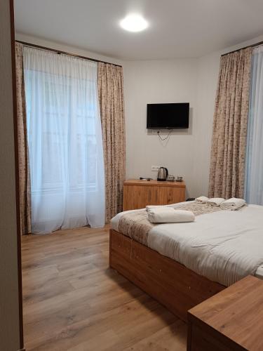 Postel nebo postele na pokoji v ubytování Panorama RABATI