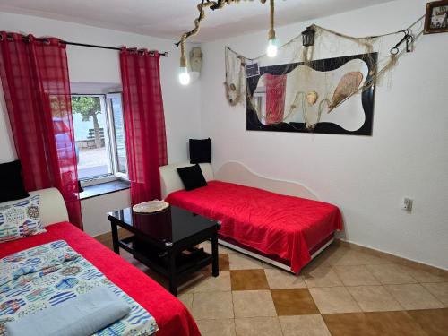 Postel nebo postele na pokoji v ubytování Apartman Vladan