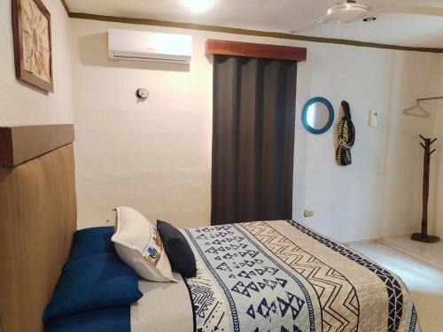 Ένα ή περισσότερα κρεβάτια σε δωμάτιο στο Casa Mia
