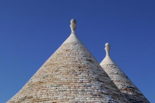 a view of the tops of two towers of a building at Trullo San Giovanni in Castellana Grotte