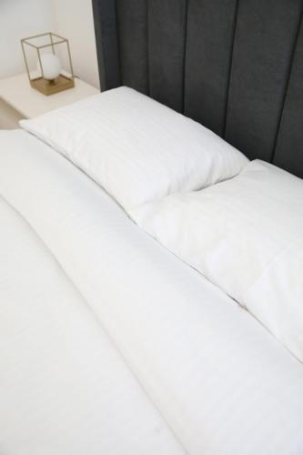 Ένα ή περισσότερα κρεβάτια σε δωμάτιο στο Exit Aparthotel