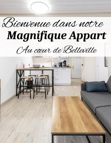 un salon avec une table et un canapé dans l'établissement Magnifique Flat le Belleville - Lumineux - 4 personnes - Proche Metro, à Paris