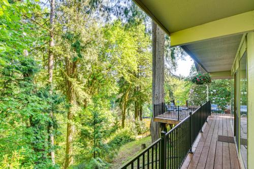 a balcony of a house with trees in the background at Riverfront Woodland Cabin Wooded and Forested Views in Woodland