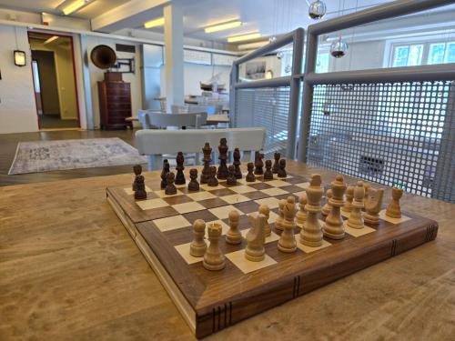 a chessboard on a table in an office at Norrqvarn Hotel & Resort by Vänerport in Lyrestad