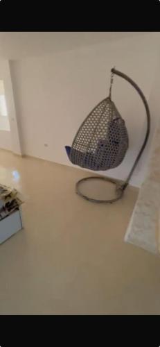 a tennis racket sitting on top of a table at Villaggio lavie in Ras Sedr
