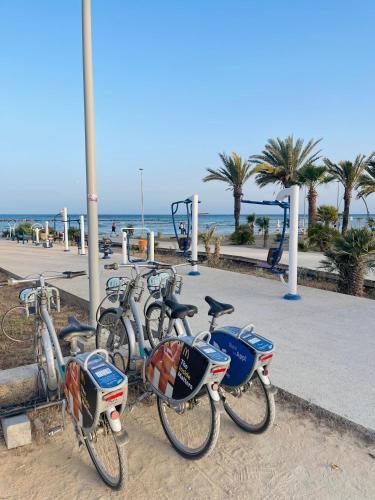 a group of bikes parked next to the beach at Sea Breeze - Oroklini in Voroklini