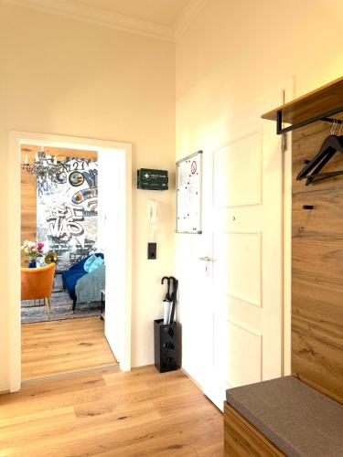 a room with a door leading to a bedroom at Dein City Apartment - 2 Zi -Schick - Private Parking in Chemnitz