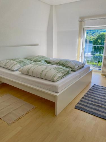Postel nebo postele na pokoji v ubytování Hotel Rheinblick