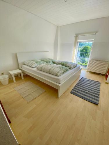 Postel nebo postele na pokoji v ubytování Hotel Rheinblick