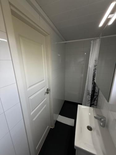 Koupelna v ubytování Sefdalur