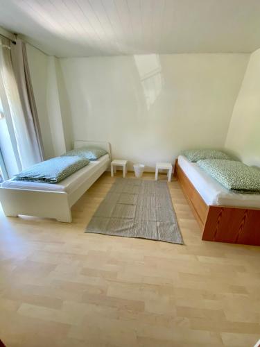 Postel nebo postele na pokoji v ubytování Hotel Rheinblick