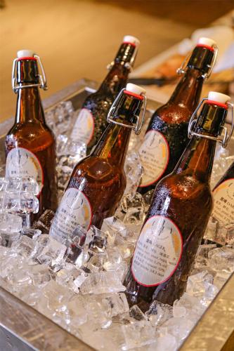 a group of bottles of beer sitting on ice at Kempinski Hotel Fuzhou in Fuzhou