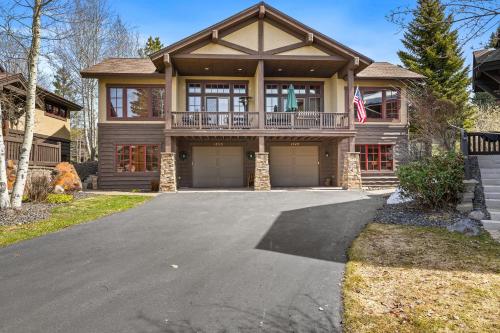 a house with a driveway in front of it at Lady Luck by the Beach - Downtown Greystone unit with air conditioning in McCall