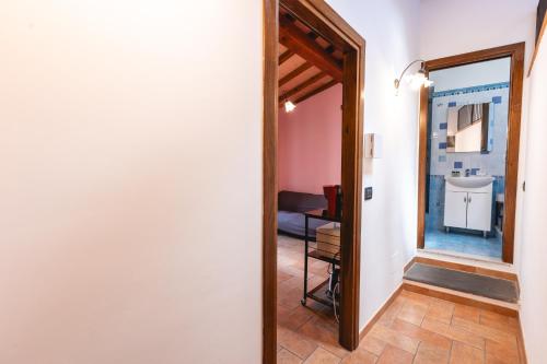 Кровать или кровати в номере Palazzetto San Lorenzo